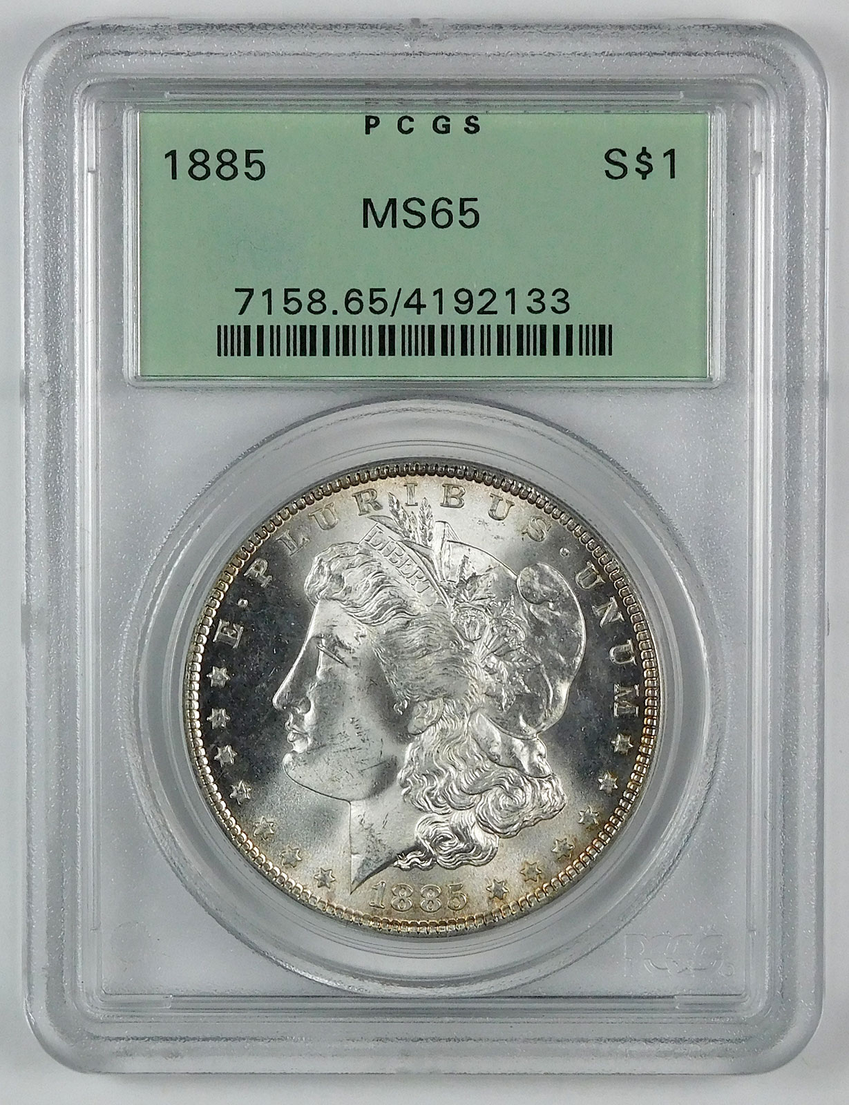 1885 Morgan Silver Dollar - PCGS MS 65 - OGH